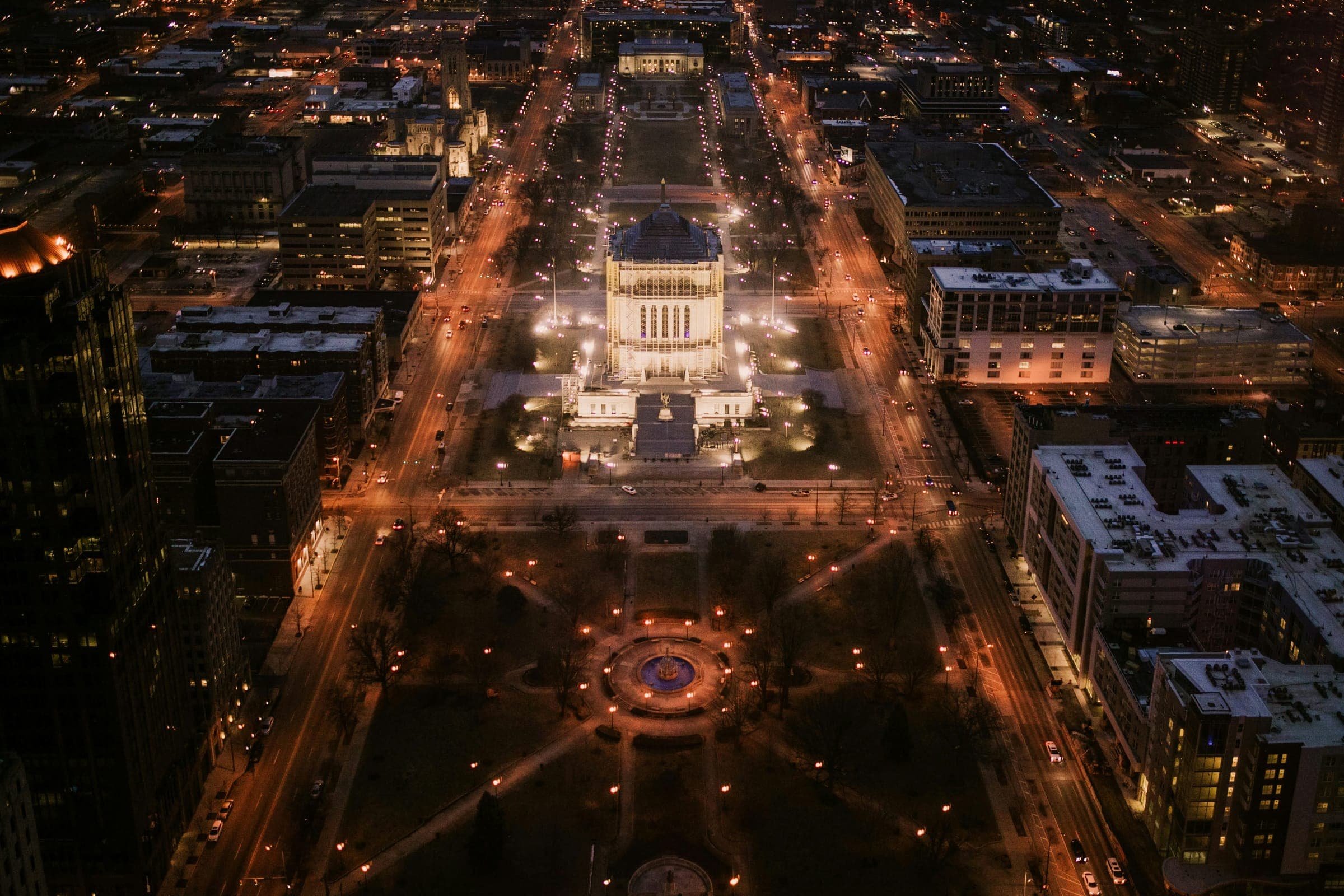 Aerial night view of downtown Indianapolis and the Indiana World War Memorial